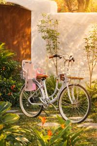 a bike parked in front of a building at AnB Garden in Ða Gia