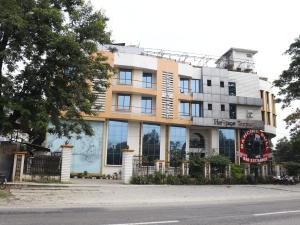 a building on the side of a street at Heritage Tezpur in Tezpur