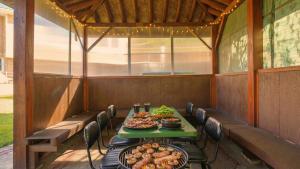 a table with food on it in a room at Gapyoeng New Cheongpyeong Pension in Gapyeong