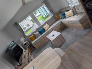 an overhead view of a living room with a couch at T&K's Caravan in Morecambe
