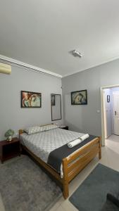 a bedroom with a bed in a room at Vila Eni in Smederevo +24 photos