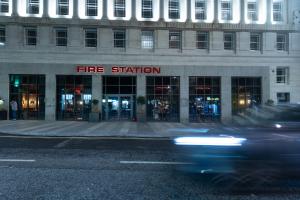 a car driving in front of a fire station at Hotel Gotham Newcastle in Newcastle upon Tyne