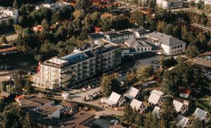 an aerial view of a building in a city at Imperiall Resort&MediSPA-DOMKI PREMIUM in Sianozety