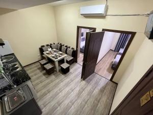 an overhead view of a dining room with a table at Tashkent apart hotel in Tashkent