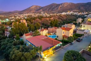 an aerial view of a town with houses and mountains at Hersonissos Villas in Hersonissos