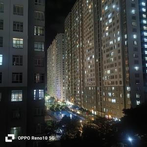 a view of a city at night with tall buildings at Hotel Phương Linh 360 phạm hùng in Ho Chi Minh City