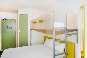 Postel nebo postele na pokoji v ubytování ibis Budget - Dandenong