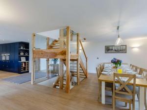 a living room and dining room with a loft bed at 5 Bed in Barnstaple oc-85165 in Charles