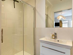 a bathroom with a glass shower and a sink at 3 Bed in Bideford oc-89018 in Westward Ho +25 photos