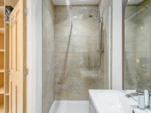 a bathroom with a shower and a sink at 2 Bed in Crediton oc-78468 in Cheriton Fitzpaine +20 photos