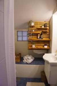 a bathroom with a sink and a toilet at New Wellness & Spa Boutique Residence Rovinj in Rovinj +74 photos