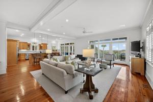 a living room with a couch and a table at EA1A: 1A Eugenia Avenue in Kiawah Island