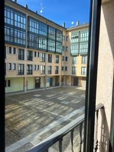 a view from a window of a building at Piso Ría de Ribadeo in Ribadeo