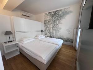 Krevet ili kreveti u jedinici u okviru objekta Hotel Caroline