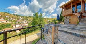 a view from the balcony of a house at Къща за гости "Панорама" Проглед in Smolyan