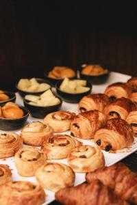 a bunch of pastries sitting on a table at Dabas Hotel in Dabas
