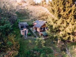 an aerial view of a house with solar panels on it at Rokova Dolina in Draganovac