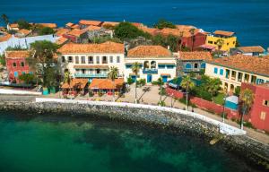 an aerial view of a town next to the water at Résidence Soros - Île de Gorée in Dakar