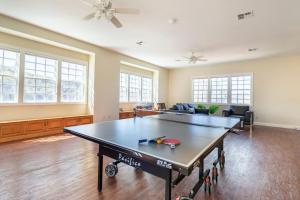 a living room with a ping pong table in it at Blue Stone Chateau Yosemite Pool Spa Secluded in Abbeyville