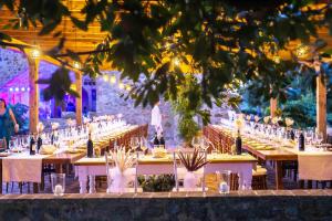 a table set up for a wedding with wine glasses at Podere Cerciano in Radicondoli