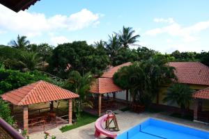 a view of a house with a swimming pool at Hotel Serrano Martins in Martins