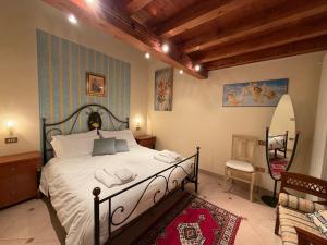 a bedroom with a bed and a surfboard in it at DOMA LUXURY HOMe in Desenzano del Garda