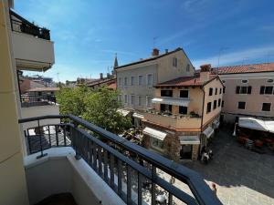 a view of a city from a balcony at Campo Porta Nuova in Grado