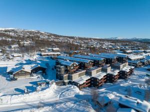 an aerial view of a resort in the snow at Stølstunet Leilighet 617 in Beitostøl