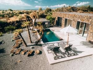 an aerial view of a villa with a swimming pool at Casa Arim in Orosei