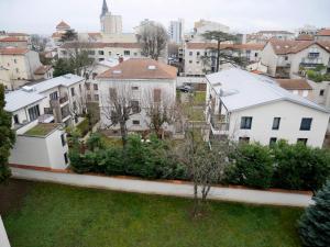 arial view of a city with buildings at Le chalet in Oullins