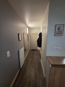 an empty hallway with a hallway leading into a room at Amour x Paris x Netflix x Wheel chair Access in Ivry-sur-Seine