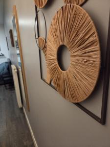 a wooden decoration on the wall of a room at Amour x Paris x Netflix x Wheel chair Access in Ivry-sur-Seine +3 photos