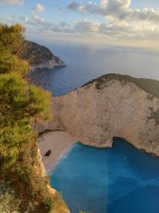 an aerial view of a rock formation in the ocean at Α Peaceful Nest in Volímai
