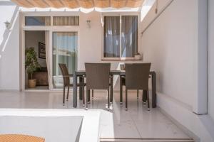 a dining room with a table and chairs at Nice Bungalow with Two Bedrooms in Adeje