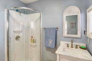 a bathroom with a shower and a sink at 3 Mi to Dtwn Monticello! Waterfront Studio Getaway in Monticello