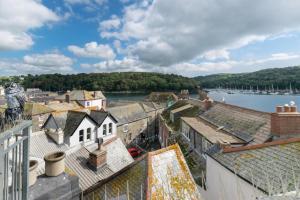 a view of a town with a river and buildings at 3 Bed in Fowey oc-p00647 in Fowey
