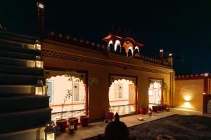 a house at night with lights on it at Fort Jangaldhar in Bikaner