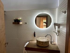 a bathroom with a sink and a mirror at Hostal Avenjúcar in Tolosa +15 photos