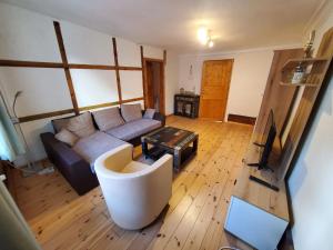 an overhead view of a living room with a couch and a table at Altstadthaus Stralsund Külpstraße 11 in Stralsund +81 photos