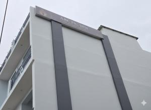 a building with a sign on the side of it at Arctic Inn in Gorakhpur