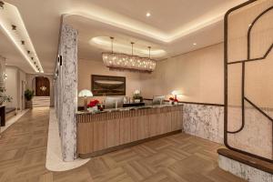 a lobby of a hotel with a reception desk at The Cole Boutique Hotel & Spa in Cape Town
