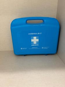 a blue suitcase sitting on the floor next to a wall at Lorenzo in Benaguacil