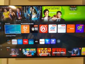 a television screen with many different apps on it at Loft próximo à Oktoberfest Blumenau in Blumenau