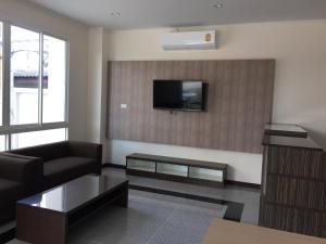 TV a/nebo společenská místnost v ubytování TTT Hotel