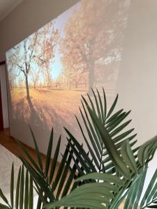 a tv screen with a picture of a park at Apartament SLEEP&GO Ostrowiec Świętokrzyski in Ostrowiec Świętokrzyski
