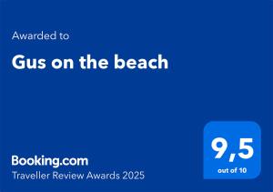 a blue screen with the text emailed to guns on the beach at Gus on the beach in Quartu SantʼElena