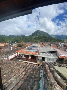 a view from the roof of a town with buildings at Europa Ecotours in Jardin