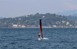 a person is on the water with a sail at Rio Molino 1 in Stresa