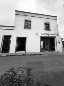 a black and white photo of a building at Suite Matlazinca by Casa Bravo in Toluca +3 photos