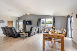 a living room with a table and chairs at 2 Bed in Somerton oc-s32606 in Somerton